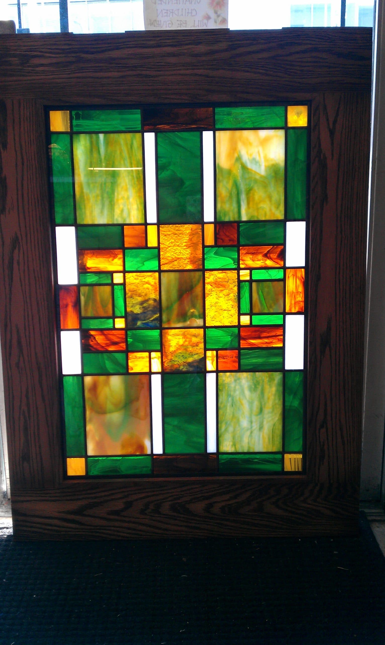 Custom geometric stained glass panel crafted at the Allen Kenoyer Glass studio